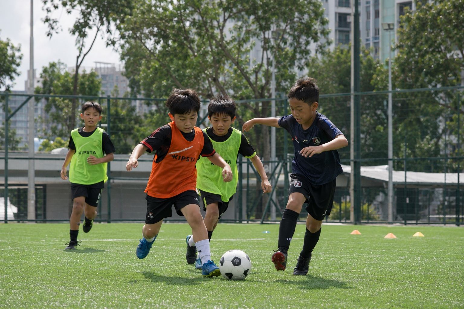 Children playing football during a Momentum Academy programme